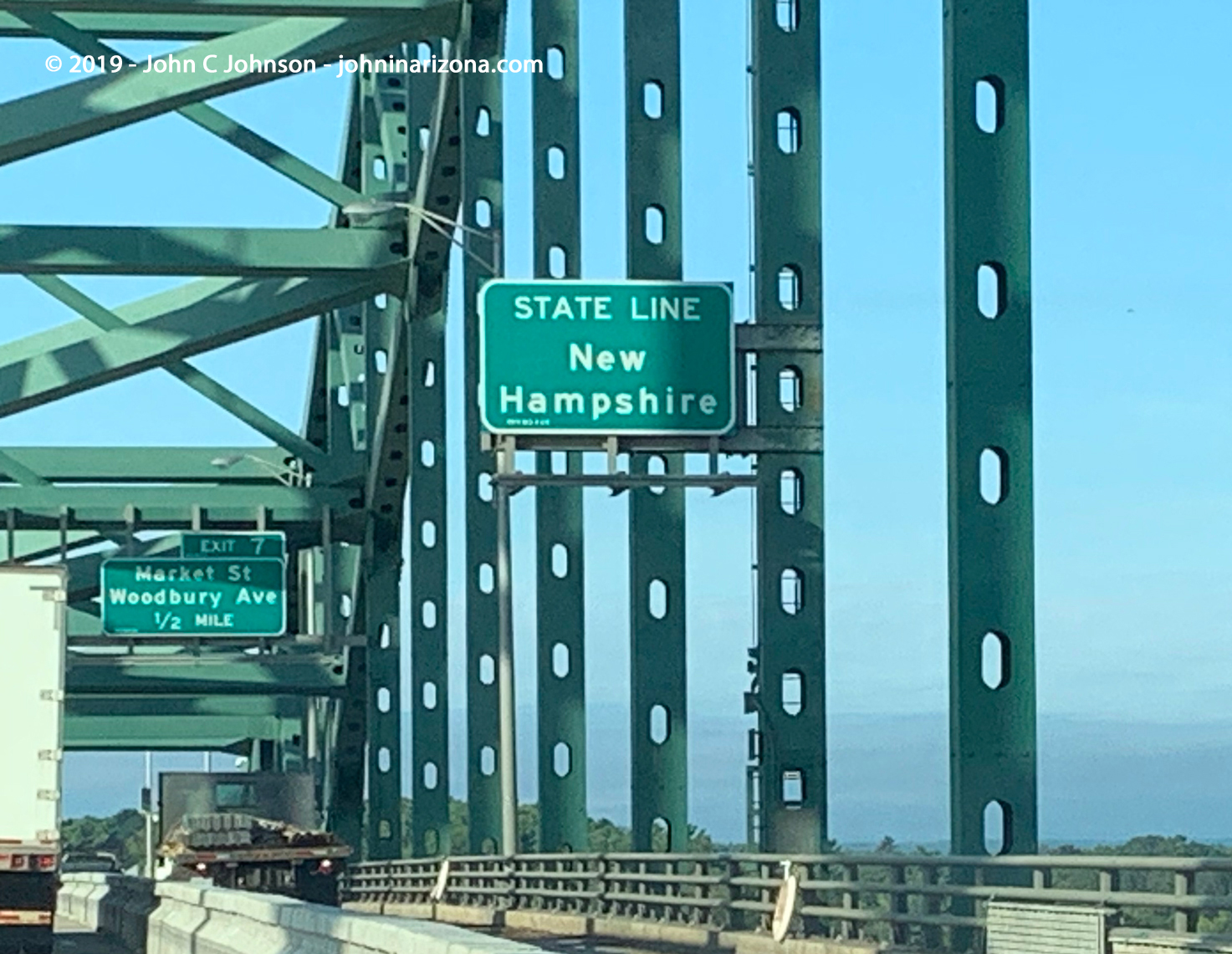 New Hampshire State Line Sign